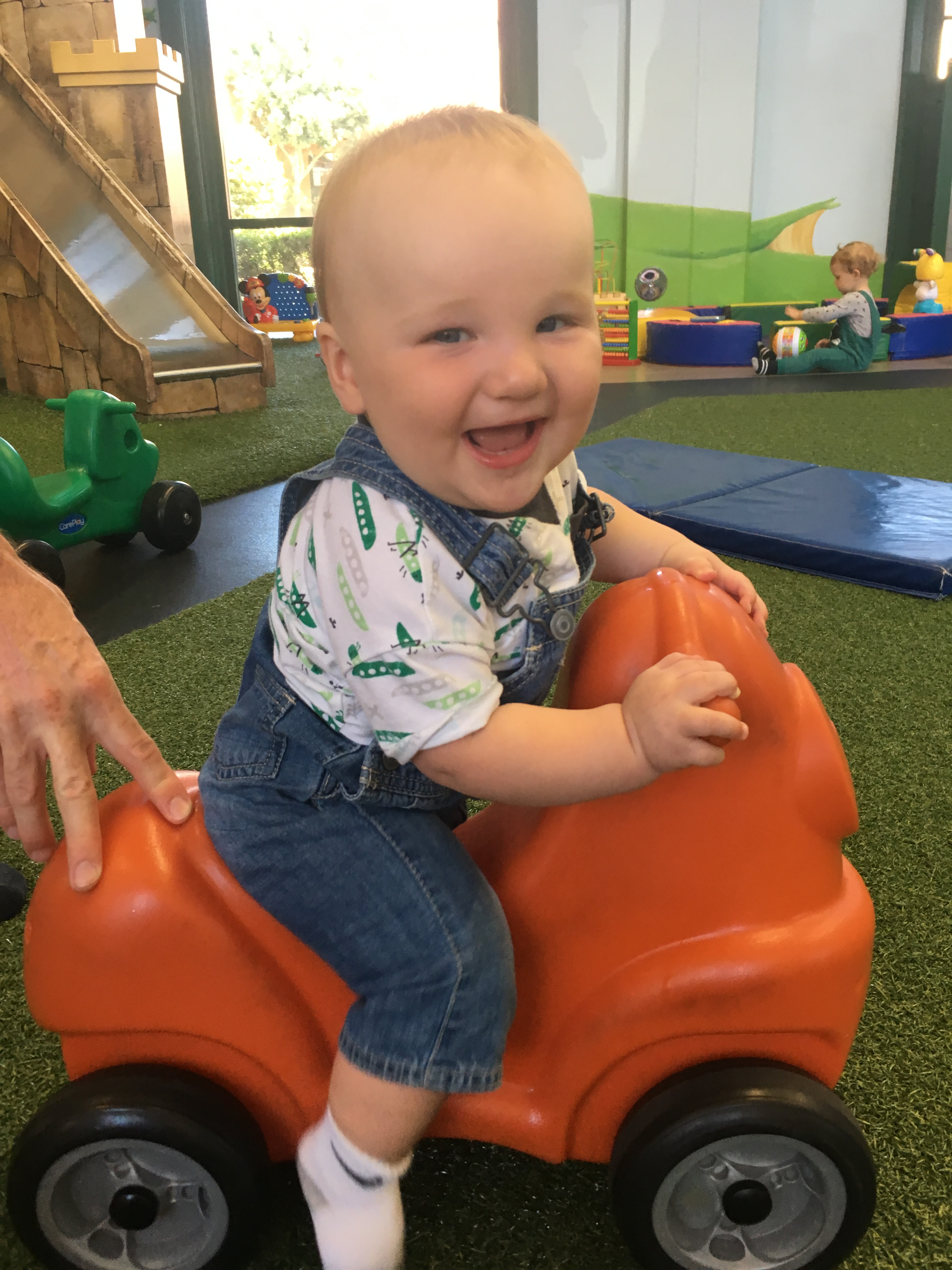 James loves riding on cars!