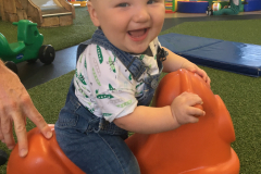 James loves riding on cars!